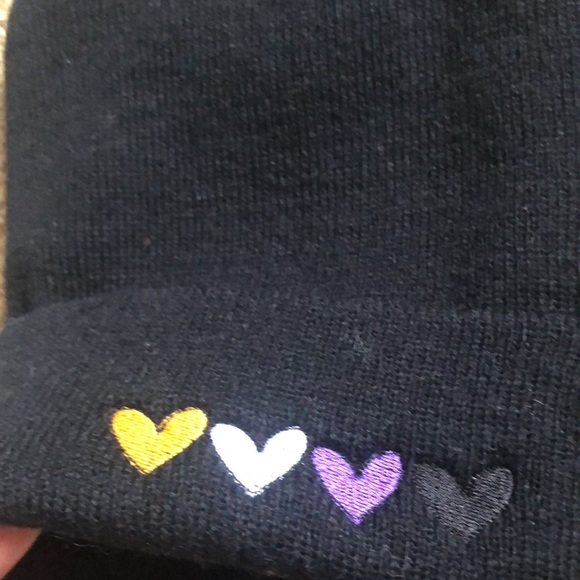 Black knit beanie with 4 hearts on brim; gold, lavender, purple & black hearts - Picture 2 of 3